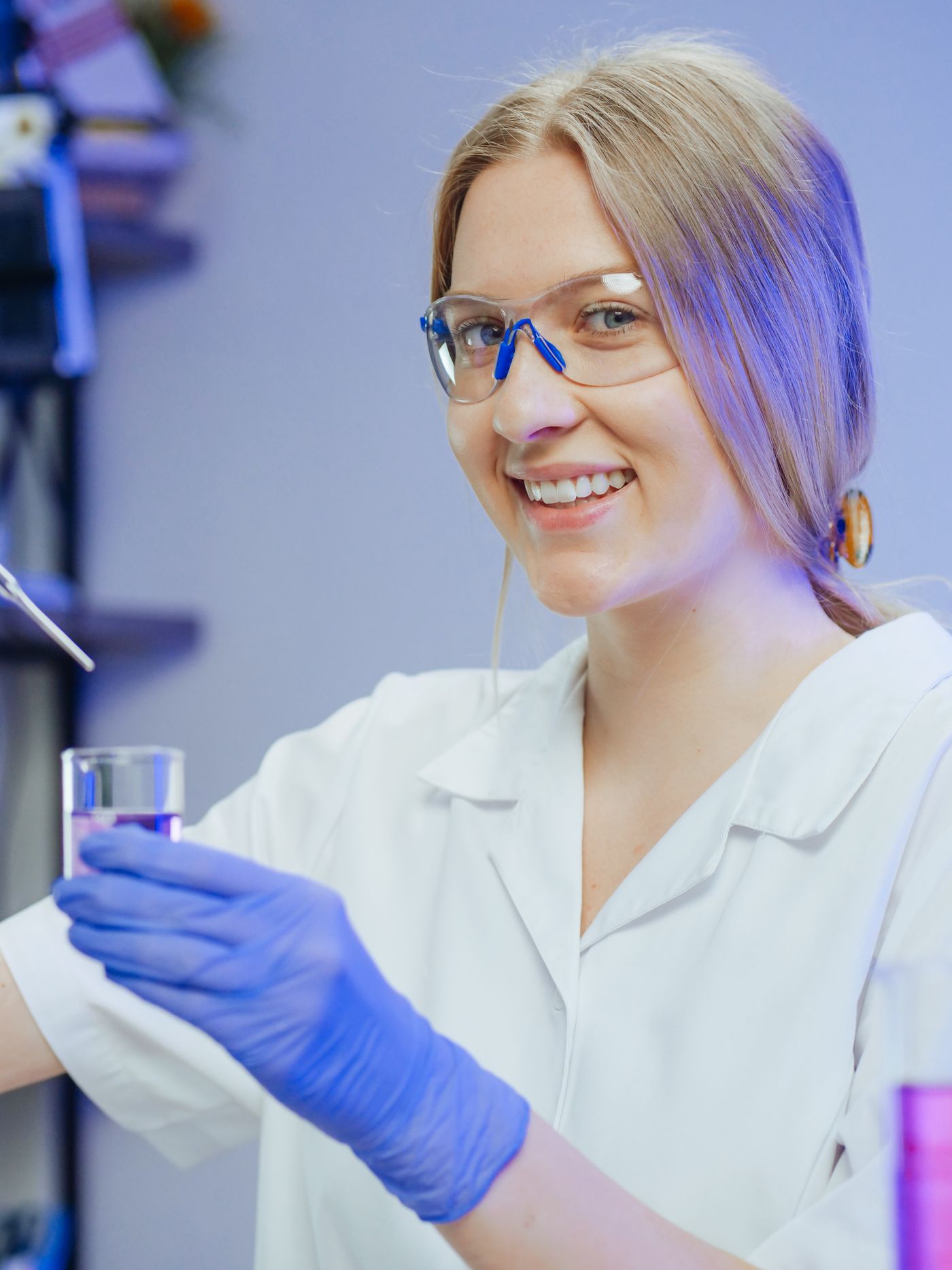 Researcher smiling in a laboratory